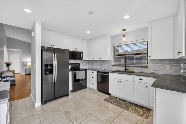 3584 SW Quail Meadow Trail E, Palm City, FL 34990