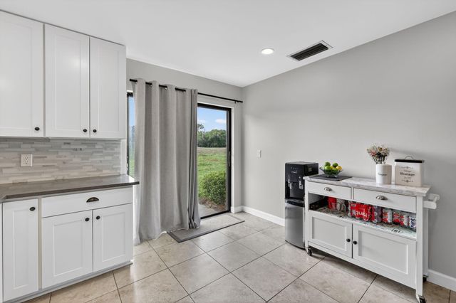 3584 SW Quail Meadow Trail E, Palm City, FL 34990