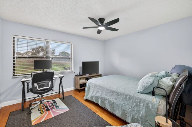 3584 SW Quail Meadow Trail E, Palm City, FL 34990