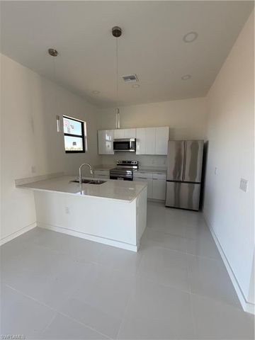 331 Rawlings AVE, Lehigh Acres, FL 33974