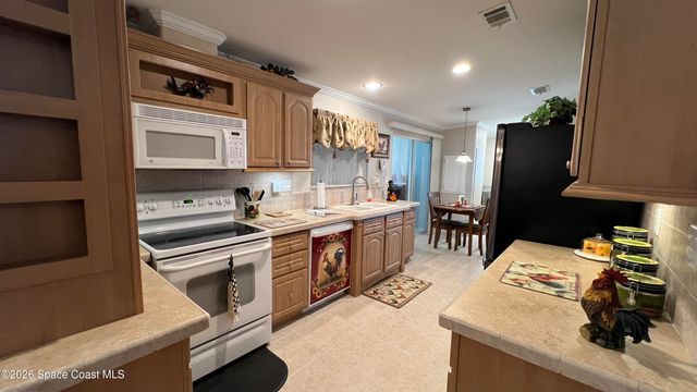 621 Puffin Drive, Barefoot Bay, FL 32976
