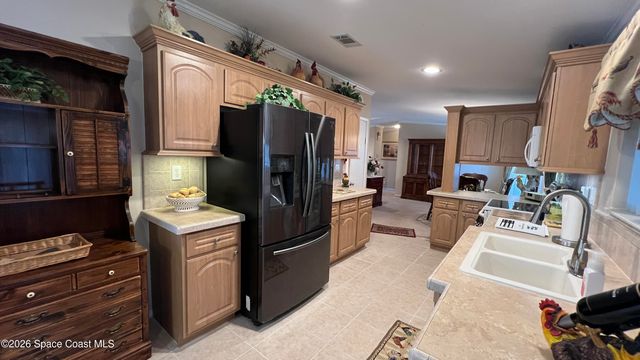 621 Puffin Drive, Barefoot Bay, FL 32976