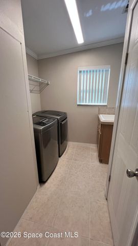 621 Puffin Drive, Barefoot Bay, FL 32976