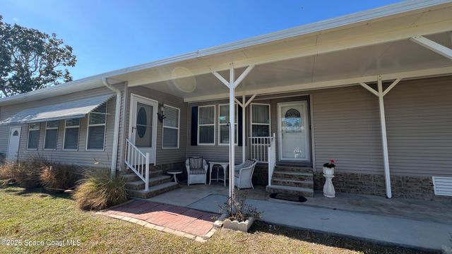 621 Puffin Drive, Barefoot Bay, FL 32976