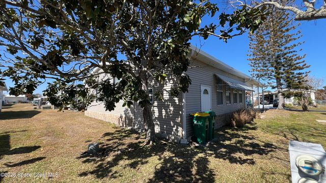 621 Puffin Drive, Barefoot Bay, FL 32976