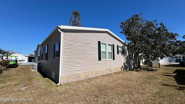 621 Puffin Drive, Barefoot Bay, FL 32976