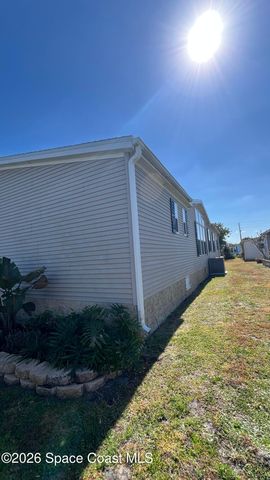 621 Puffin Drive, Barefoot Bay, FL 32976