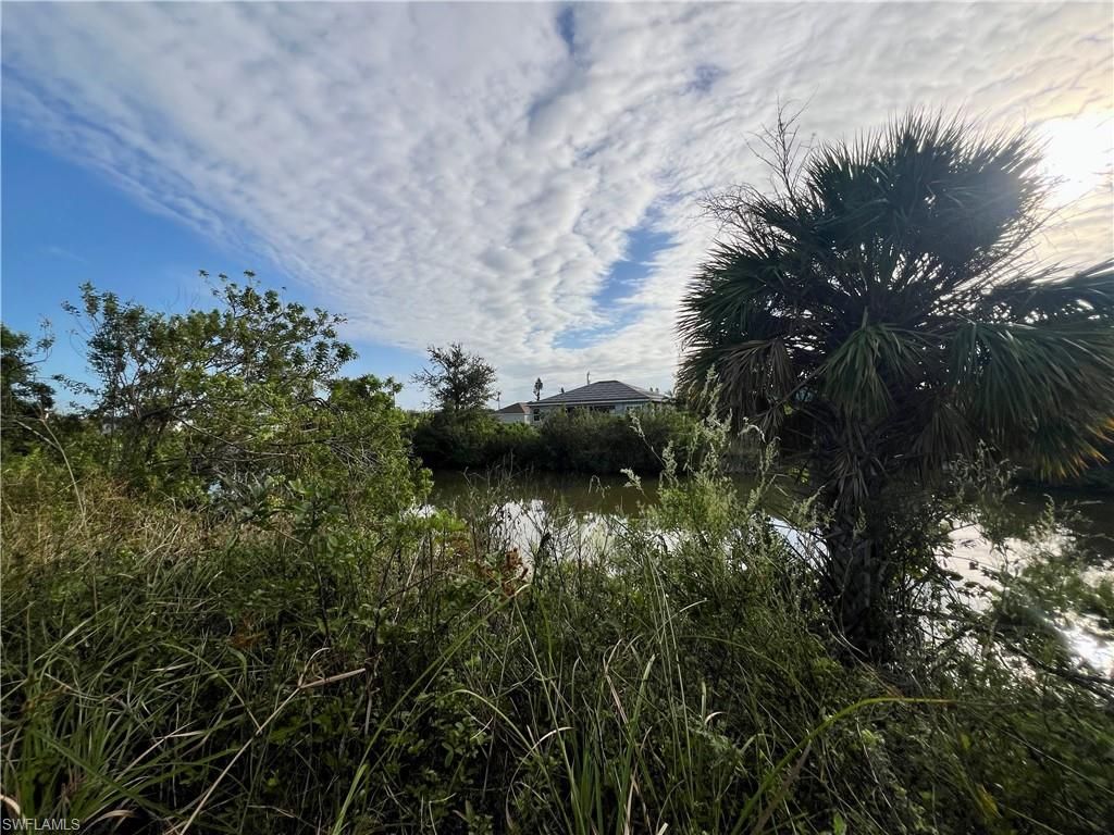 1229 NE 13th PL, CAPE CORAL, FL 33909 — exterior
