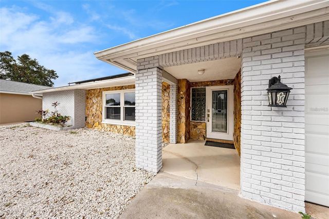 1117 RUSHMORE DRIVE, Holiday, FL 34690