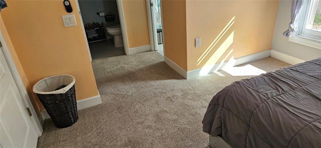 1117 RUSHMORE DRIVE, Holiday, FL 34690