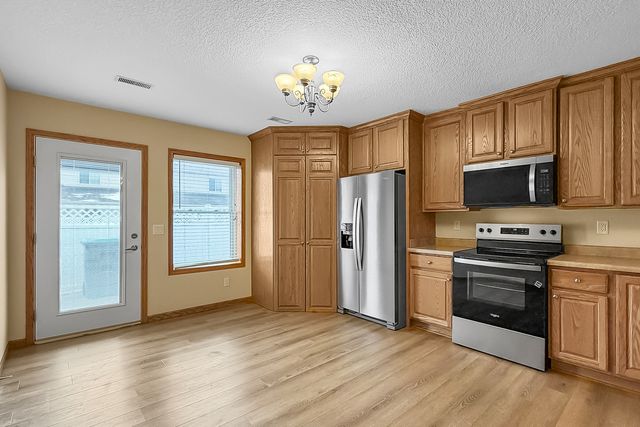 305 WALKER Way, Blue Grass, IA 52726