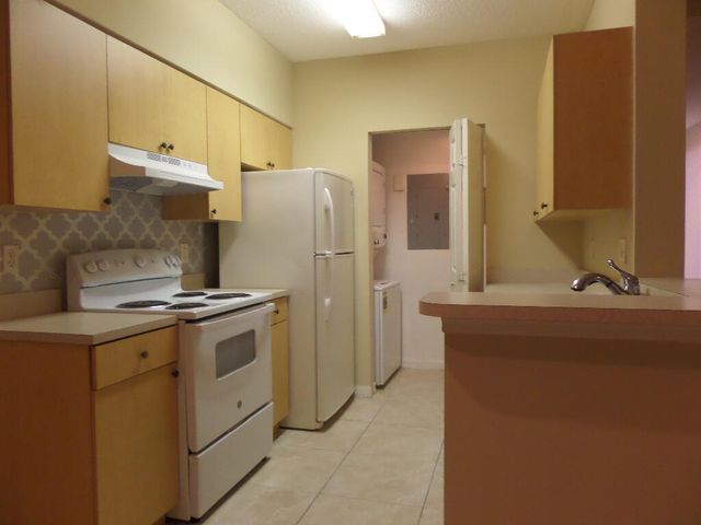 10318 Fox Trail Road 409, Royal Palm Beach, FL 33411