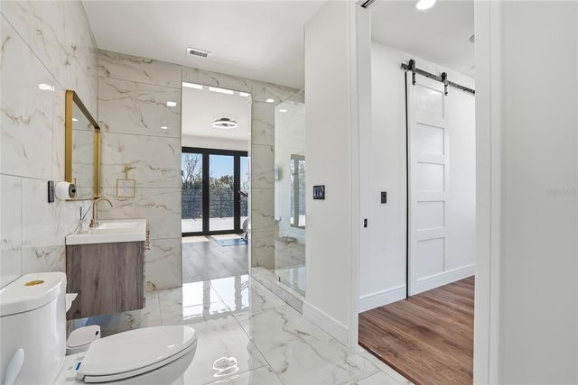 7818 N HUBERT AVENUE, Tampa, FL 33614