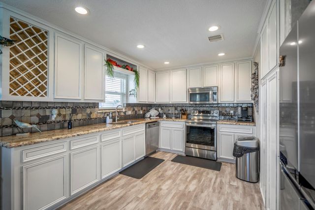 16544 John Silver Road, Jamaica Beach, TX 77554