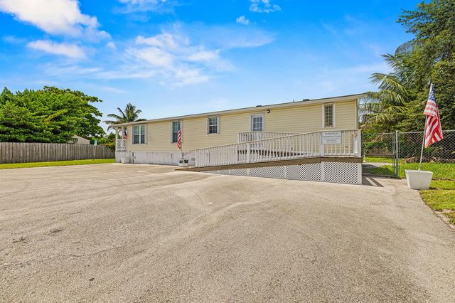 10105 SW Sandalfoot Boulevard, Boca Raton, FL 33428