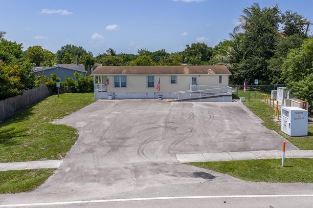 10105 SW Sandalfoot Boulevard, Boca Raton, FL 33428