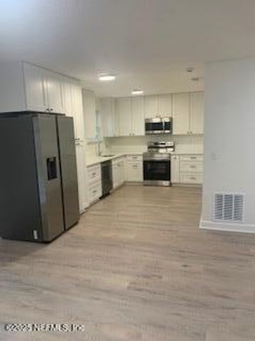 1043 E MIMOSA COVE Court, Jacksonville, FL 32233