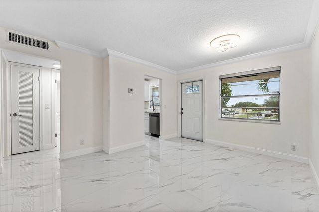 9911 Sandalfoot Boulevard 113, Boca Raton, FL 33428