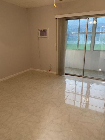 399 Sheffield Q, West Palm Beach, FL 33417