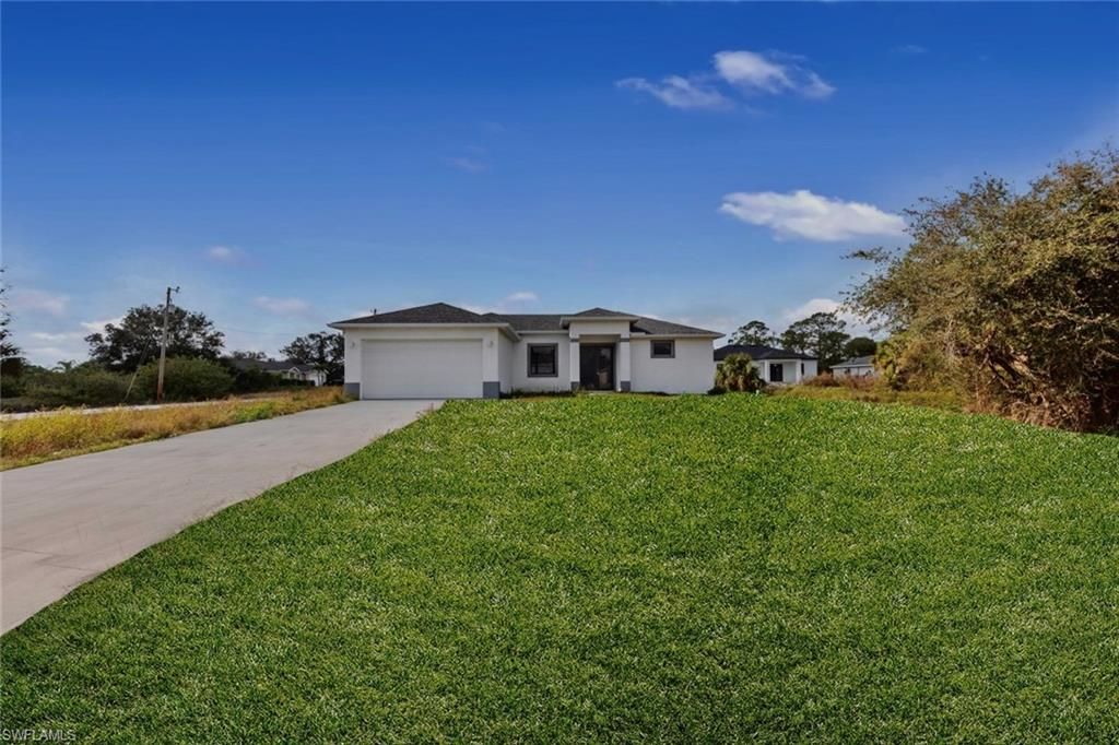 352 Rawlings AVE, Lehigh Acres, FL 33974