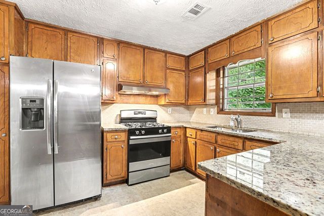 815 Dunleith Court, Stone Mountain, GA 30083