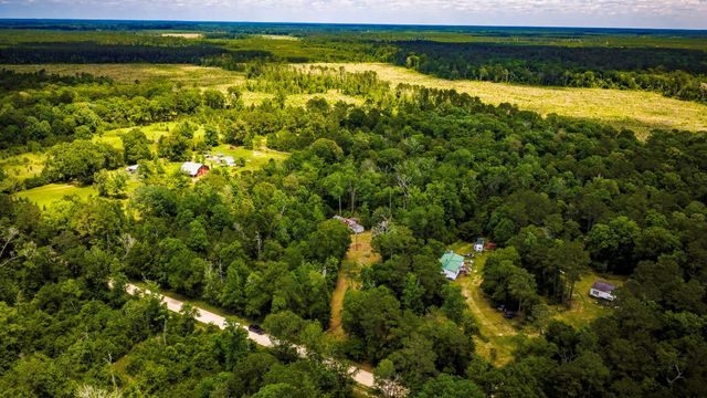 5800 Outlaw Bend Drive, Rye, TX 77369