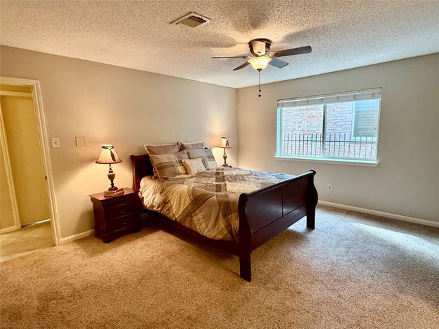 13 Maywind Court, The Woodlands, TX 77381