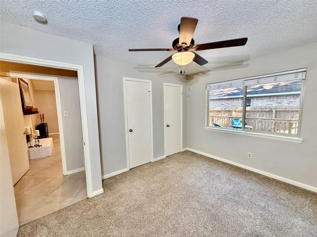 13 Maywind Court, The Woodlands, TX 77381