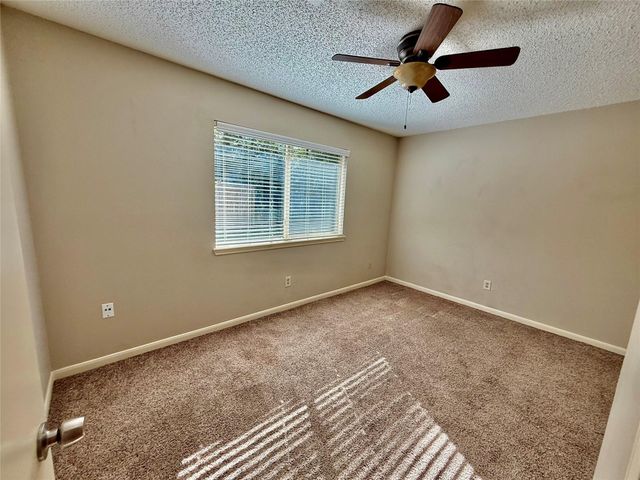 13 Maywind Court, The Woodlands, TX 77381