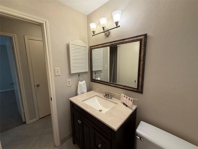 13 Maywind Court, The Woodlands, TX 77381
