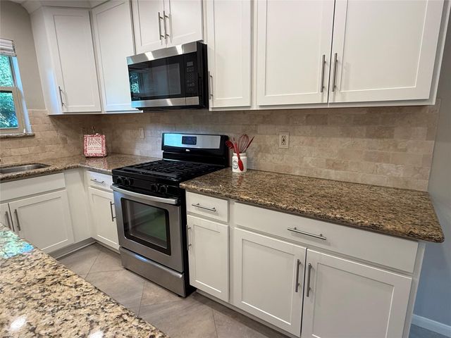 13 Maywind Court, The Woodlands, TX 77381