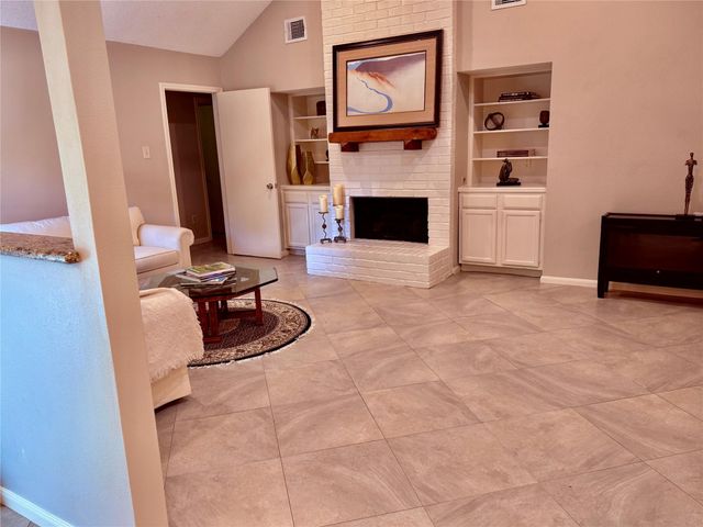 13 Maywind Court, The Woodlands, TX 77381