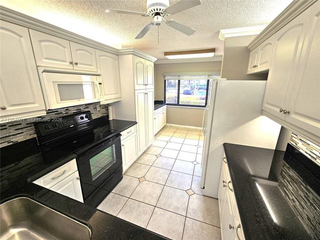 10722 W Clairmont Cir 102, Tamarac, FL 33321