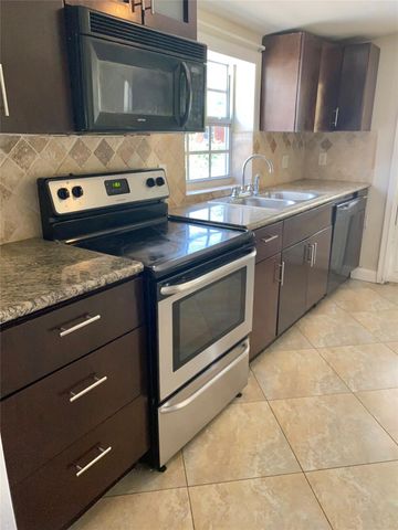 1430 NE 41st Dr, Pompano Beach, FL 33064