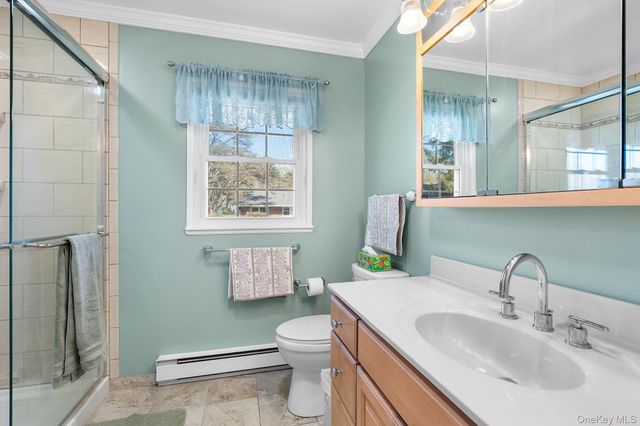 54 Aylesbury Court B, Ridge, NY 11961