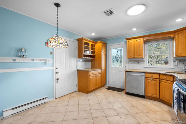 54 Aylesbury Court B, Ridge, NY 11961