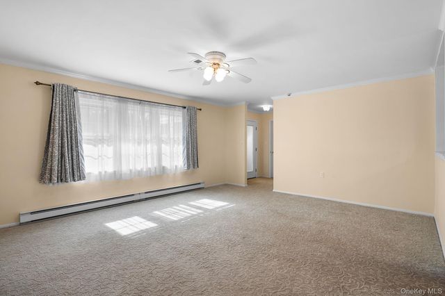 54 Aylesbury Court B, Ridge, NY 11961