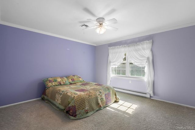 54 Aylesbury Court B, Ridge, NY 11961