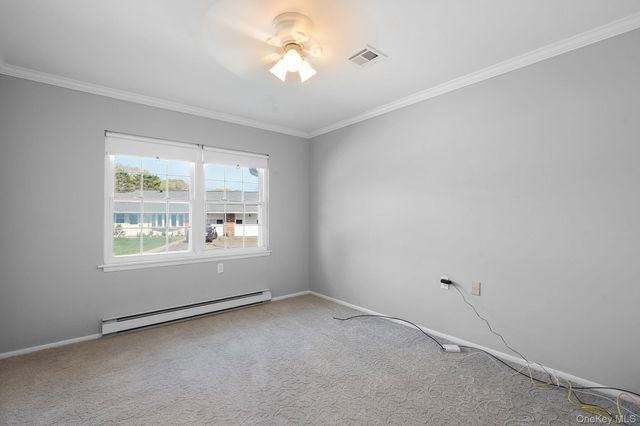 54 Aylesbury Court B, Ridge, NY 11961