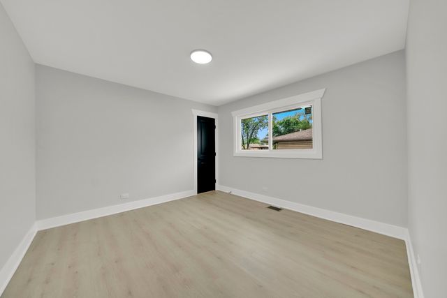 153 W 27th Place, South Chicago Heights, IL 60411
