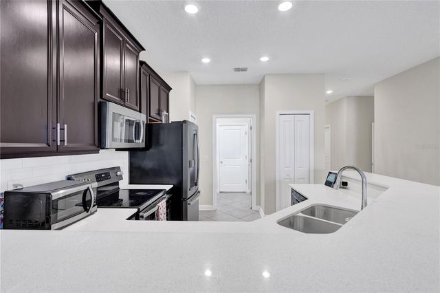 3541 BELLAND CIRCLE C, Clermont, FL 34711