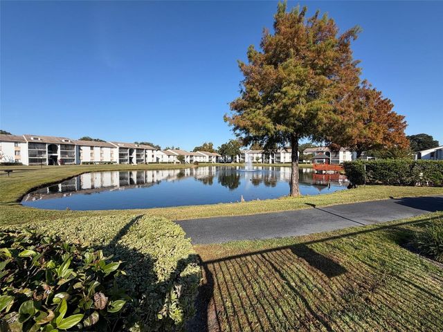 8213 SUN SPRING CIRCLE 12, Orlando, FL 32825