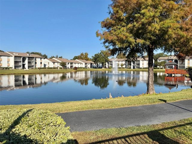 8213 SUN SPRING CIRCLE 12, Orlando, FL 32825