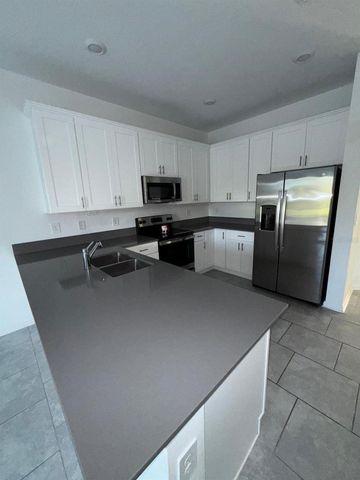 7477 STONE CREEK TRAIL, Kissimmee, FL 34747