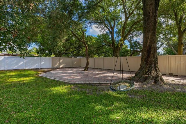 7918 LAKESIDE WOODS DRIVE, Orlando, FL 32810