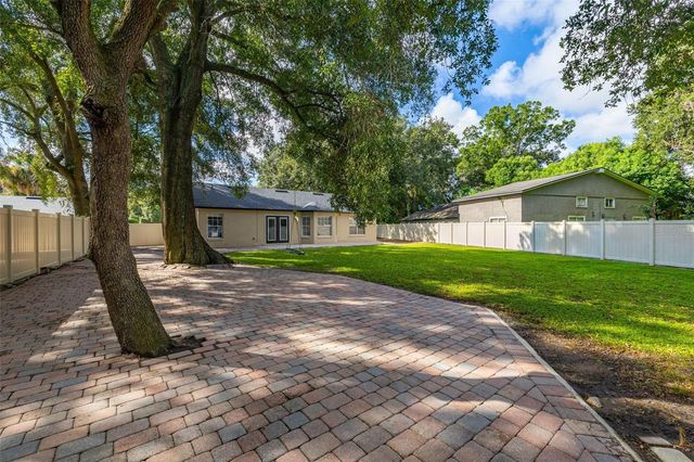 7918 LAKESIDE WOODS DRIVE, Orlando, FL 32810