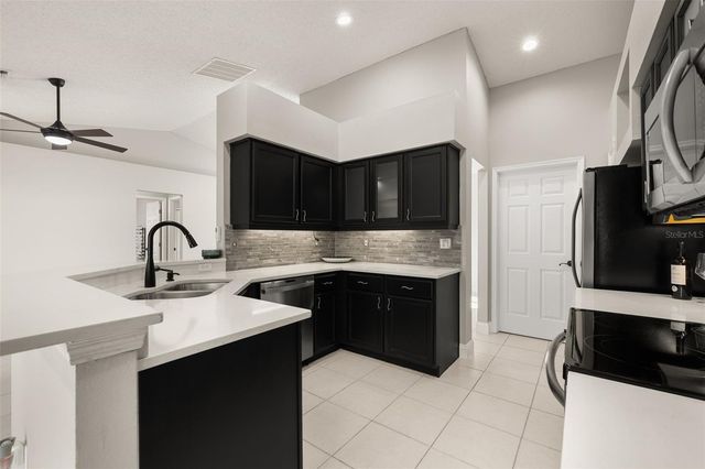7918 LAKESIDE WOODS DRIVE, Orlando, FL 32810