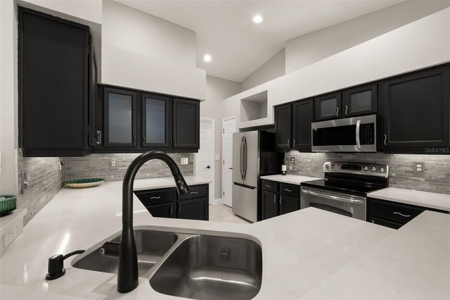 7918 LAKESIDE WOODS DRIVE, Orlando, FL 32810