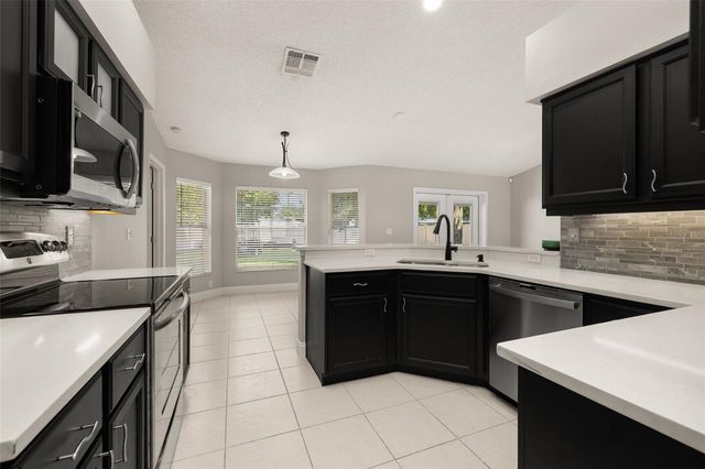 7918 LAKESIDE WOODS DRIVE, Orlando, FL 32810