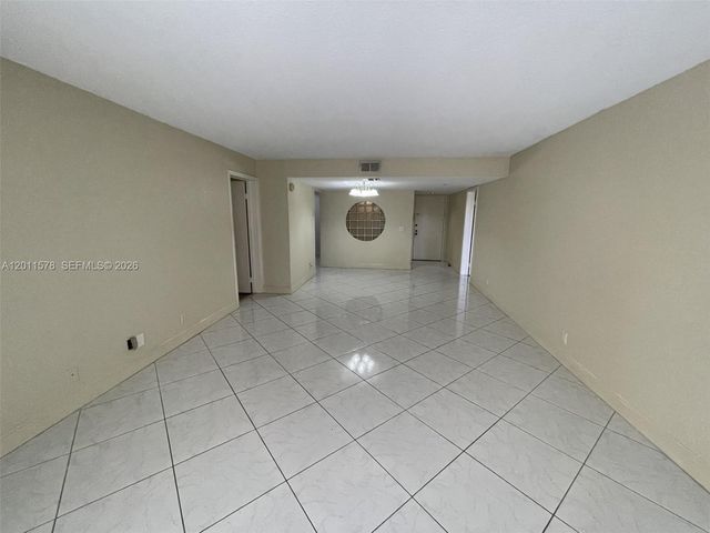491 Racquet Club Road 303, Weston, FL 33326